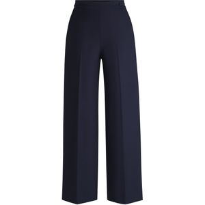 Broek met wijde pijpen en knoop aan de taille