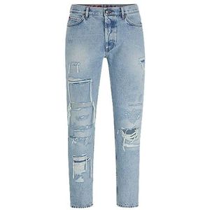 Tapered-fit jeans van blauw denim met slijtage-effecten