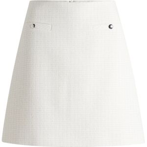 Minirok in bouclé van een katoenmix met zakdetail