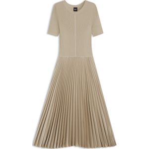 Jurk van verschillende materialen met plissérok