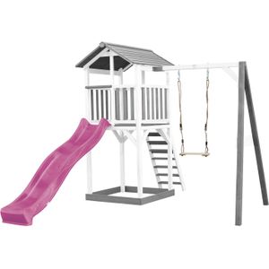 AXI Beach Tower Speeltoestel van hout in Grijs en Wit | Speeltoren met zandbak, schommel en paarse glijbaan | Speelhuis op palen voor de tuin