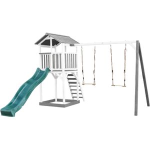AXI Beach Tower Speeltoestel van hout in Grijs en Wit | Speeltoren met zandbak, dubbele schommel en groene glijbaan | Speelhuis op palen voor de tuin