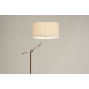 Messing staande lamp met beige linnen lampenkap