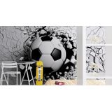 Fotobehang - Voetbal komt door de muur, zwart/wit, te koop in 11 maten, incl behanglijm