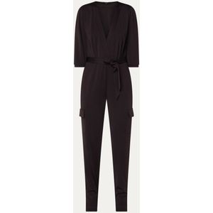 Claudia Sträter Tapered fit jumpsuit met steekzakken en strikceintuur