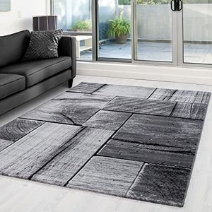 Houtlook steen-look woonkamer laagpolig tapijt plat hoogpolig tapijt