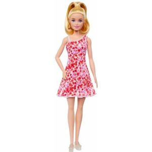 Barbie Fashionistas Pop 205 met blonde paardenstaart, in jurk met roze en rode bloemen, sandalen met plateauzolen en grote oorringen, HJT02