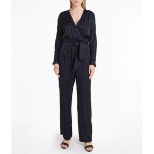 Jumpsuit met lange mouwen TOMMY HILFIGER. Viscose materiaal. Maten 36 FR - 34 EU. Zwart kleur