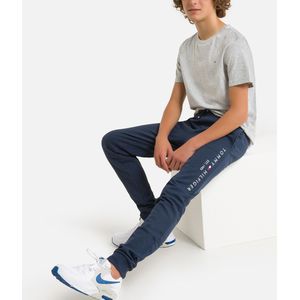 Joggingbroek TOMMY HILFIGER. Katoen materiaal. Maten 10 jaar - 138 cm. Blauw kleur