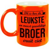 Leukste en meest geweldige broer cadeau mok / beker neon oranje 330 ml