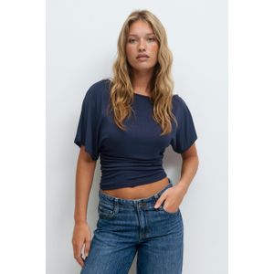 Sloped shoulder top