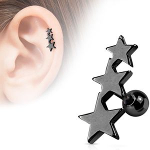 Helix piercing met drie zwart gekleurde sterren