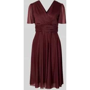 Cocktailjurk met V-hals