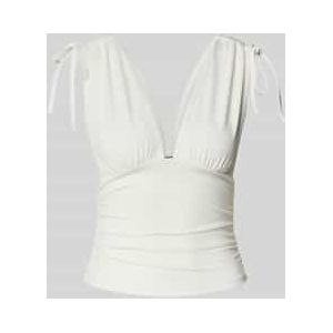 Top met V-hals en vetersluiting