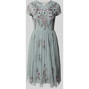 Knielange cocktailjurk met pailletten