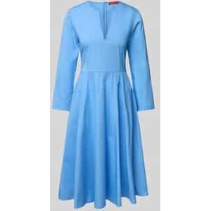 Knielange jurk met steekzakken, model 'DISCO'