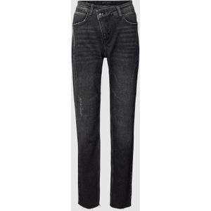 Jeans met asymmetrische band