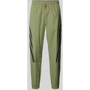 Tapered fit sweatpants met labeltypische strepen