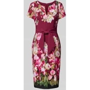 Knielange kokerjurk met strikdetail