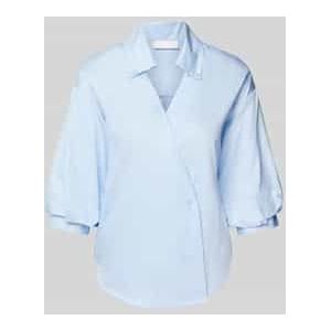 Slim fit blouse met diepe V-hals