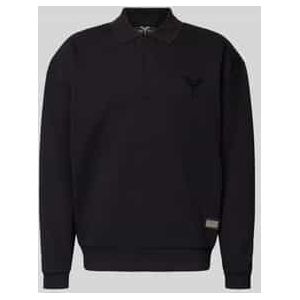 Oversized sweatshirt met polokraag