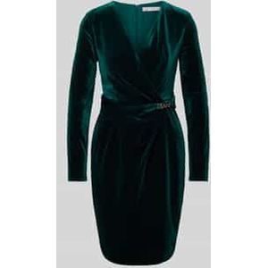 Cocktailjurk in wikkellook