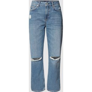 Low rise jeans in destroyed-look