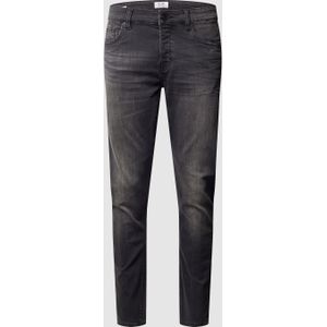 Stone-washed slim fit jeans