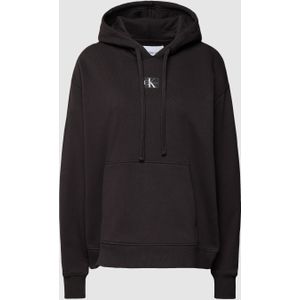 Oversized hoodie met labelpatch