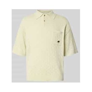 Relaxed fit poloshirt met pointellemotief