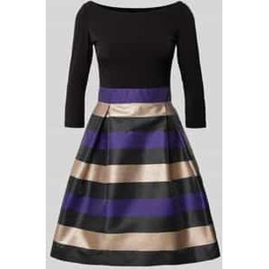 Knielange cocktailjurk met effectgaren