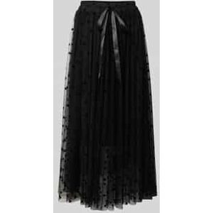 Maxirok met ondoorzichtige onderrok