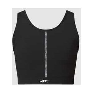 Korte top met contrastinzetten