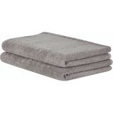 Set van 2 badlakens handdoeken grijze badstof katoen 100 x 150 cm chevron patroon textuur badhanddoeken