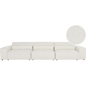 Driezitsbank modulaire bank wit bouclé sofa gestoffeerd stof zwarte poten modern woonkamer