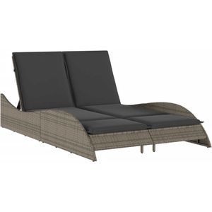 vidaXL Ligbed met kussens 114x205x73 cm poly rattan grijs