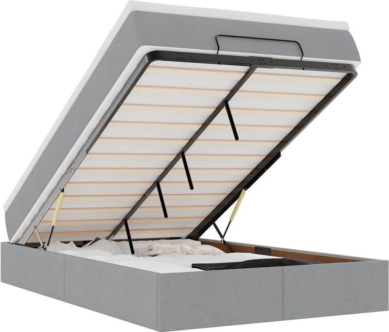 vidaXL Ottoman bed met matras 120x190 cm stof lichtgrijs