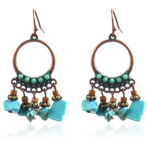 Ronde dames oorbellen met hangers en turquoise steentjes