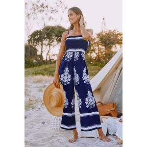 Marineblauwe en witte jumpsuit met gesmokt lijfje en wijde pijpen