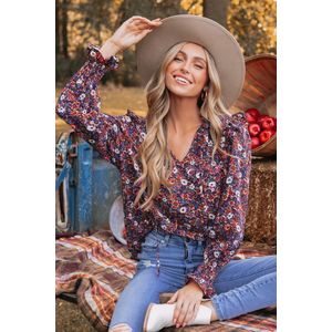 Top met bloemenprint en ruches met strikhals