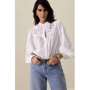 Witte blouse met kanten details