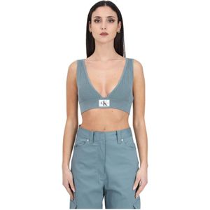 Calvin Klein Jeans, Poederblauwe Geribbelde Crop Top met V-hals en Elastische Band Blauw, Dames, Maat:S