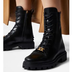 Tod's, Schoenen, Dames, Zwart, 41 EU, Leer, Zwarte leren combat boots met ketting