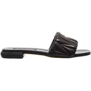 Miu Miu Sandalen - Matelasse Slides in zwart