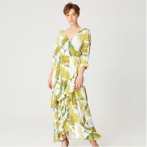 Tropische print frisse midi -jurk met kruisbuste
