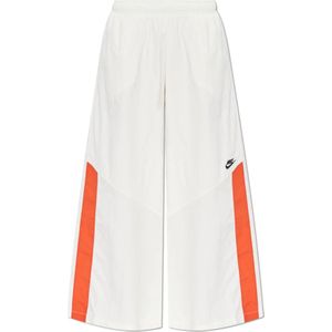 Nike, Dames, Broeken, Beige, Maat: L Nylon,