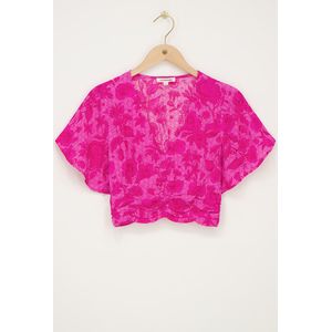 Roze top met bloemenprint en smock