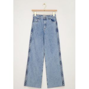 Blauwe jeans met vlecht detail