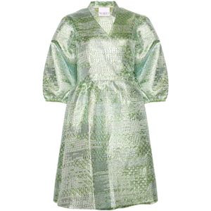 Jannie Aya-jurk in lichtgroen