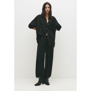 Pofbroek Van Satijnlook Stof